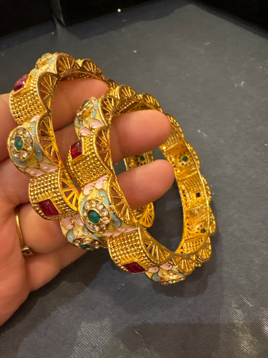 A pair of Gold & Kundan bangles